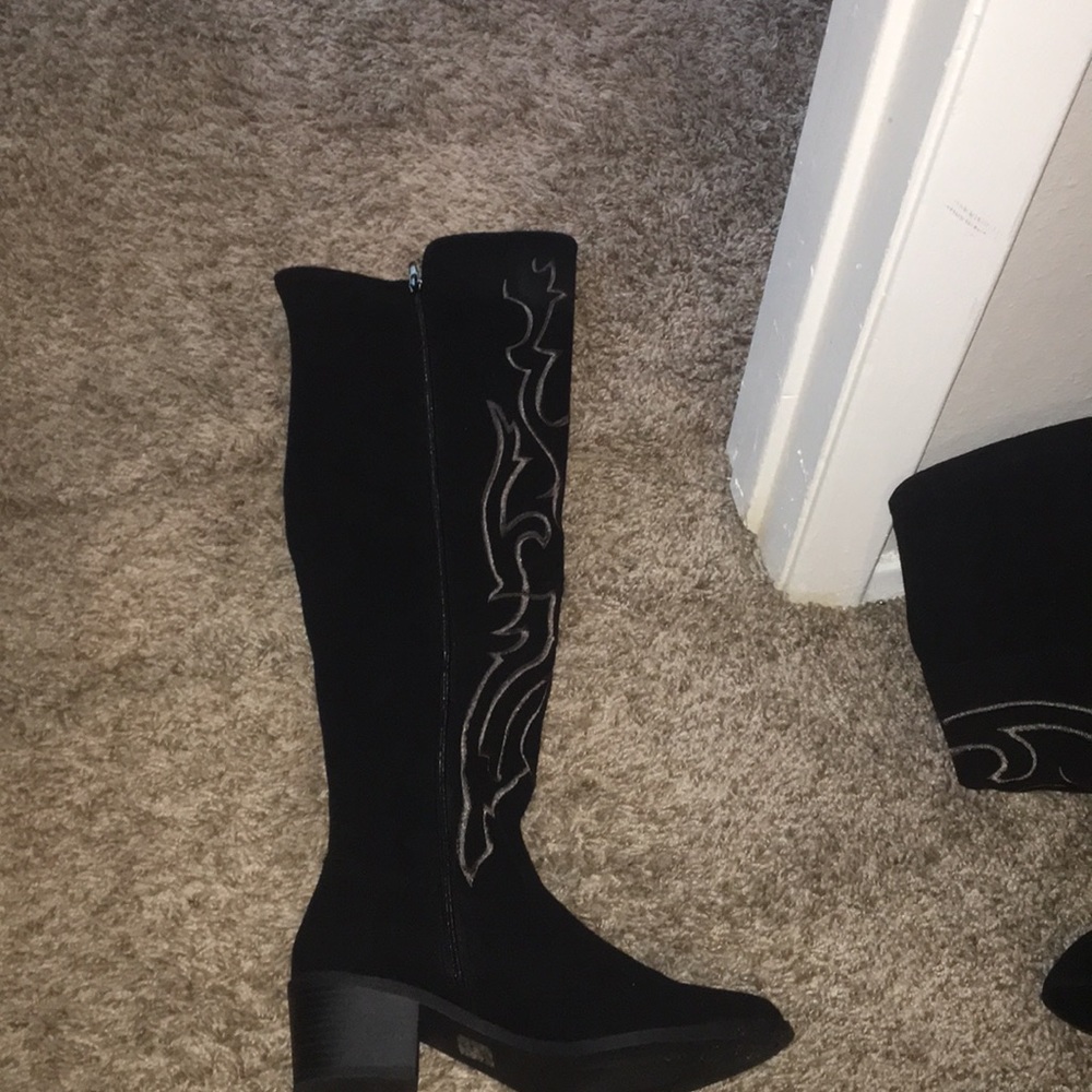 Thigh high cowboy boot